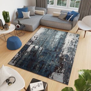 Nadčasový koberec v modré barvě
