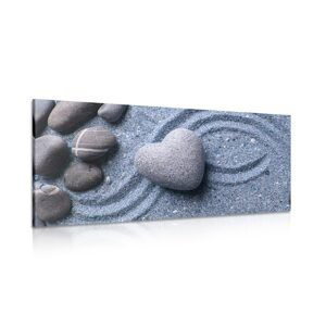 Obraz srdce z kamene na písečném pozadí