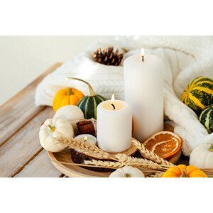 Umělecká fotografie Pumpkins and candle on a wooden table, Artsyslik, (40 x 26.7 cm)