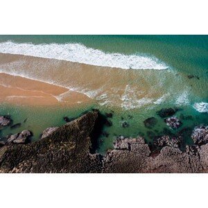 Umělecká fotografie Aerial view, water lapping rocky coast, Portugal, imageBROKER/Sonja Jordan, (40 x 26.7 cm)