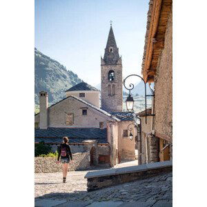 Umělecká fotografie Young Adult Woman Walking Through Quaint, Glasshouse Images, (26.7 x 40 cm)