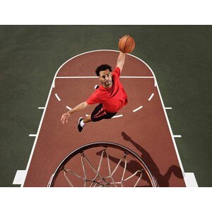 Umělecká fotografie Basketball player dunking basketball, Jupiterimages, (40 x 30 cm)