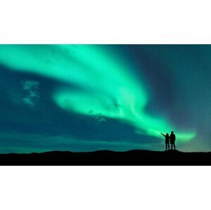 Umělecká fotografie Aurora borealis and silhouette of man and woman, den-belitsky, (40 x 22.5 cm)