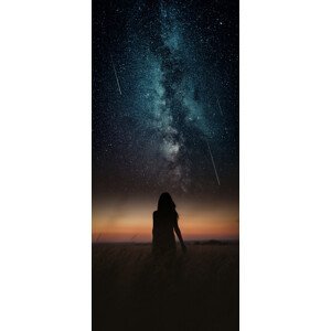 Umělecká fotografie Dramatic and fantasy scene with young woman looking universe with falling stars., Javier Pardina, (22.4 x 50 cm)